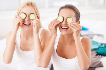 Girls making organic spa treatments at home