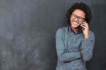 Happy man talking on the phone