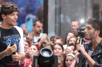 Louis Tomlinson and Zayn Malik of One Direction perform on NBC's Today Show at Rockefeller Plaza on August 23, 2013