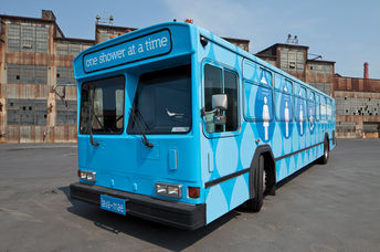 People living on the street come to the Lava Mae bus to take showers.