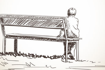 Child sitting on bench.