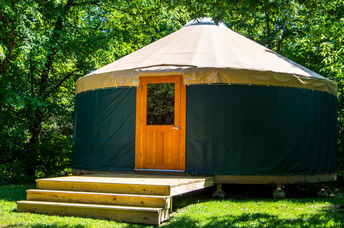 A yurt in the woods.