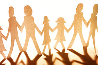 Paper cutouts of family and community