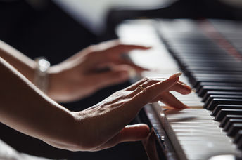 Playing the piano.
