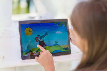 Girl playing a computer game.