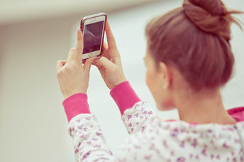 Girl taking a selfie.