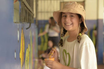 Helping to beautify a school on Good Deeds Day.