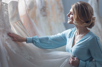 Bride shopping for her wedding gown.