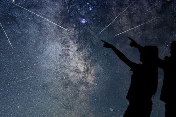 Watching a meteor shower.