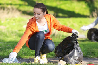 Cleaning a park on Good Deeds Day.
