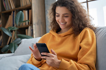 Young woman using her smartphone.