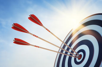 Hitting the target with arrows.