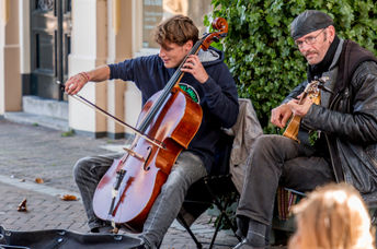 Musicians performing outdoors.