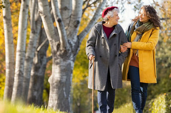 Being kind to an older neighbor.