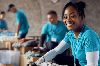 Volunteering at a humanitarian aid center for Giving Tuesday.