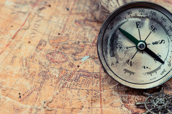 World map with a compass.