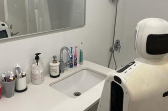 Gary is cleaning a bathroom.