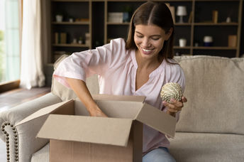 Opening a box with products.