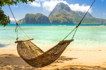A hammock on a tropical island.