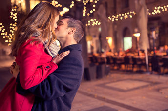 Young couple kissing.