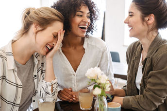 A group of friends talking and laughing.