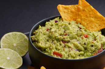 Guacamole with tortilla chips.