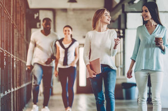 Office workers take a break from desk work and enjoy a healthy walk.