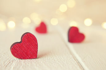 Hearts on a wooden table.