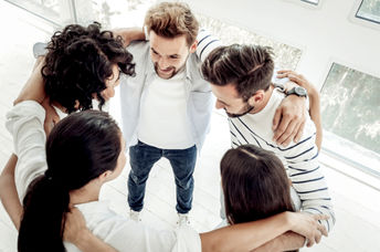 Joyful, friendly people showing a spirit of togetherness.