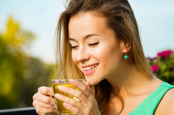 Enjoying a cup of tea outdoors.