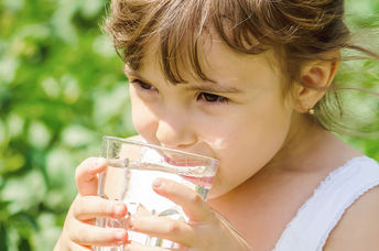 Drinking a glass of water pulled from the air.