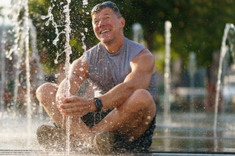 Cooling off in a city fountain.