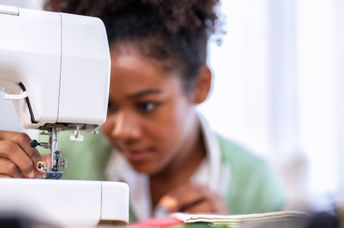 Tweaking upcycled apparel.