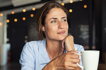 Woman deep in thought.