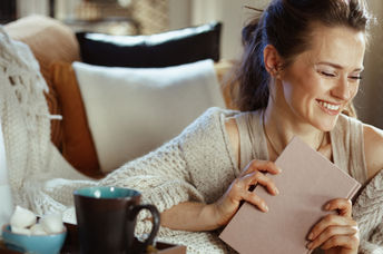 a woman embracing hygge.