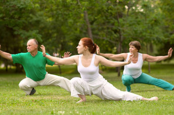 Practicing qigong in a park.