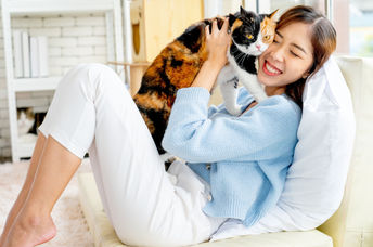 Woman with her pet cat.