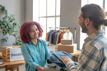Giving to a clothing drive.