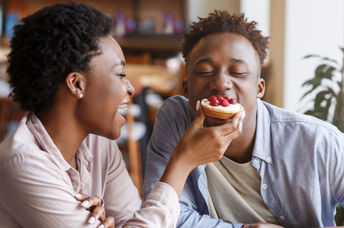 Sharing a romantic dessert on Valentine's Day.