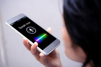 Using a  voice to synthesized speech platform on a smartphone.