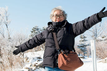 Senior woman traveling through South Korea.