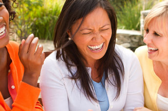 Group of friends laughing.