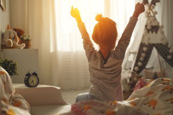 Waking up refreshed in the morning.