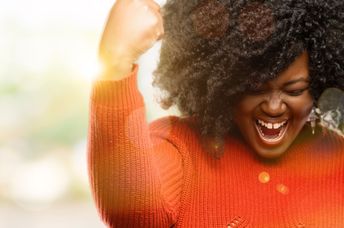 Woman celebrating a personal success.