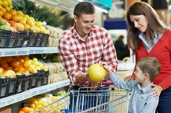 Family food shopping in a grocery store.
