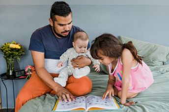 Father taking care of his children