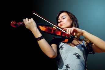 A musician playing a violin.