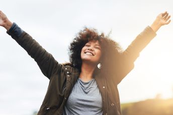 A confident and optimistic woman.