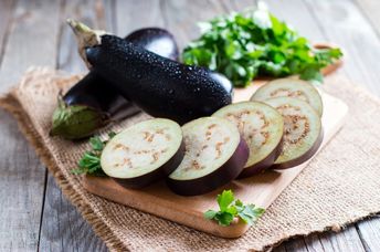Slicing an aubergine.