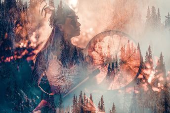 Shamanic playing on a frame drum for sound healing.